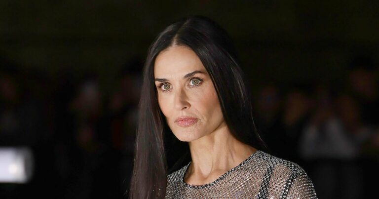 Demi Moore Sparkles in See-Through Mesh Gown in Milan