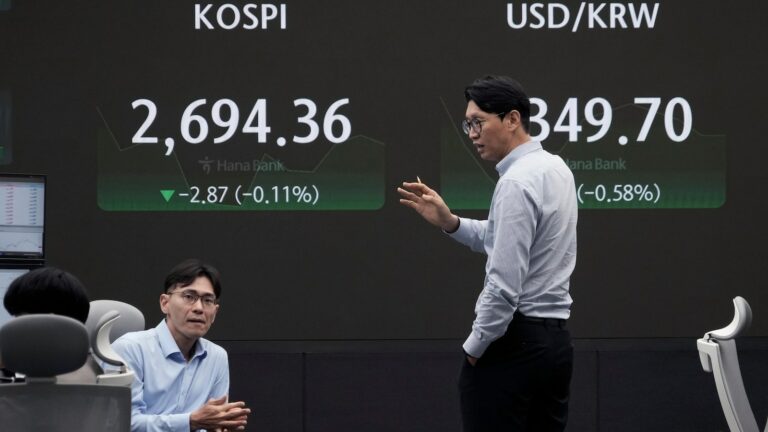 Asian stocks are mixed after Wall Street's best week of the year