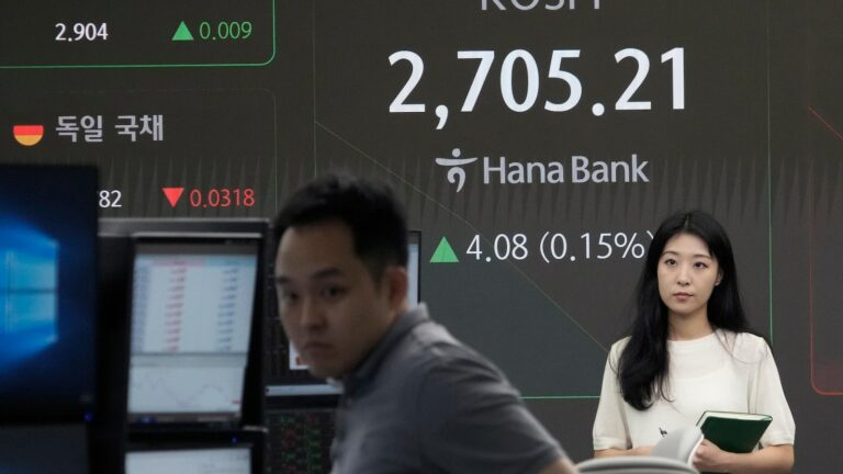 Asian benchmarks trade mixed ahead of US Fed chair's speech