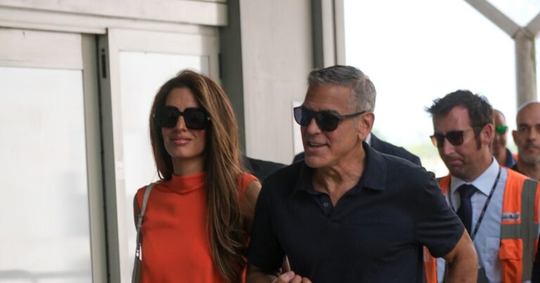 Amal Clooney's Citrus Orange Jumpsuit Rewrites the Rules of Travel Style