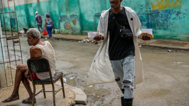 Cuba fights to come back from a nationwide blackout, then a storm that killed 7