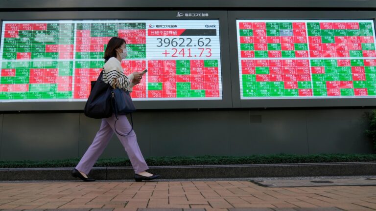 Stock market today: Asian shares are mostly higher after Wall St powers to more records