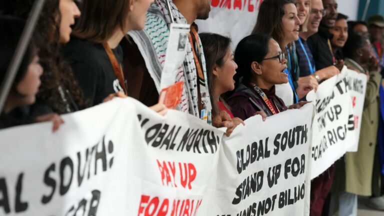 Time ticks down for negotiators at UN climate talks to find deal to curb warming and its effects