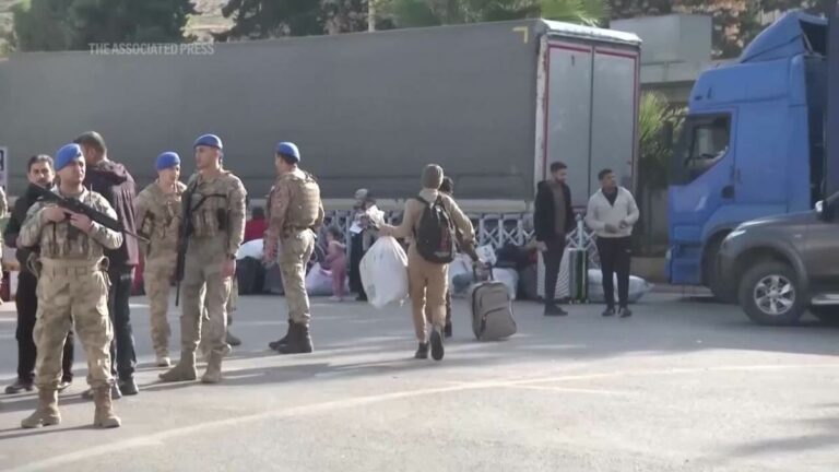 Syrian refugees wait at Turkish border, eager to return home after fall of Assad's government