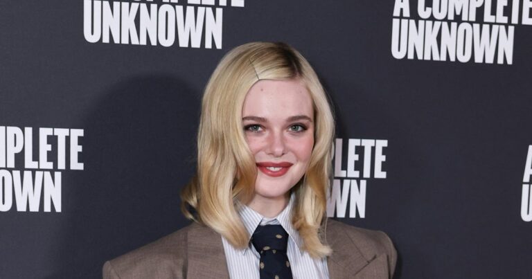 Elle Fanning Revives the Neck Tie Trend In an ’80s Power Suit